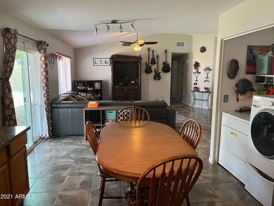Kitchen looking into living room