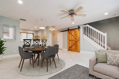 Living room showcasing custom barn door and recess