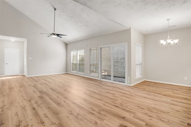 From this angle, you can really appreciate just how open the space feels. To the right is a dedicated dining area, and through the sliding glass doors, you’ll find your own private patio—perfect for morning coffee or an outdoor dinner spot.