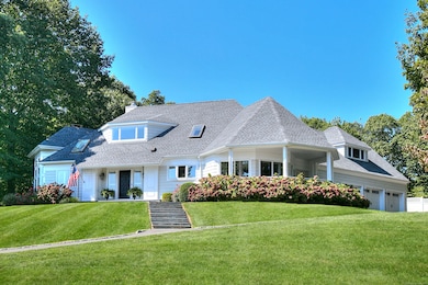 A beautiful home blending traditional charm with a nod to modern architectural distinction. Alternative Side Door entry w/ darling covered porch. 3-Car attached garage.