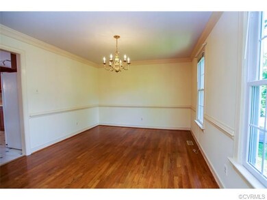 Perfect hardwoods, crown molding, chair rail