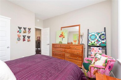 This bedroom is at the front of the home off the main entryway.