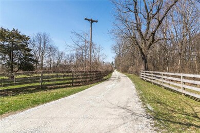 Private entry drive to your custom home nestled in the woods