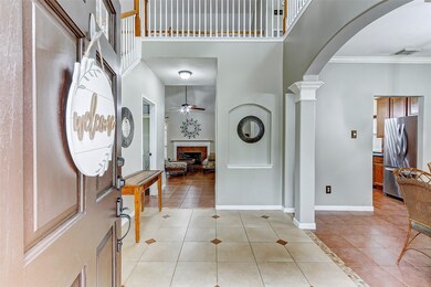 The front door leads to a spacious entryway, offer
