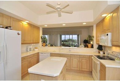 Bright, open island kitchen with THOSE views!