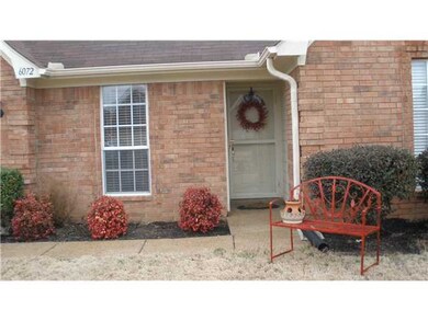 Home features gutters and storm doors front and ba