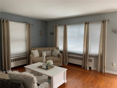Spacious Living Room with Hardwood Floors.