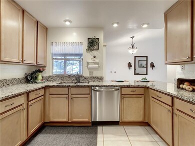 Counter height eating space as well as pass through to the back porch