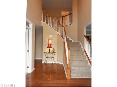 Foyer - Two story foyer with plank hardwood floors