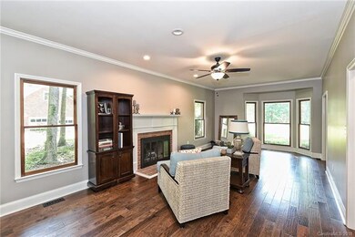 Tons of natural light in this bright & cheery living room.