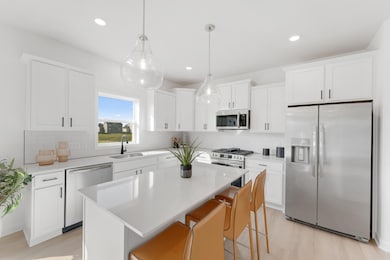 (Photo of a similar home, actual finishes may vary)