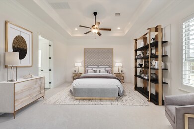 What a wonderful place to come home to, this stunning master suite greets you with plush carpet, custom paint, high ceiling, crown molding, ceiling fan with lighting, and large windows with shutters.