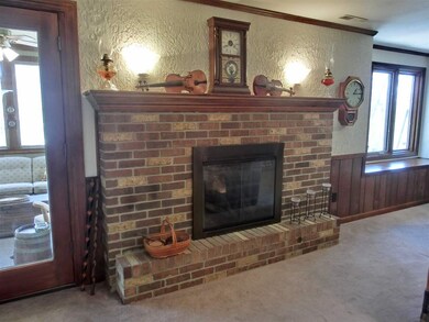 The family room gas log fireplace