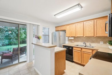 Kitchen featuring appliances with stainless steel