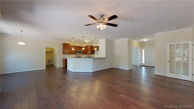 Family room toward kitchen. Buyer can still choose