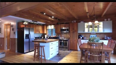 Cherry cabinets combined with a...