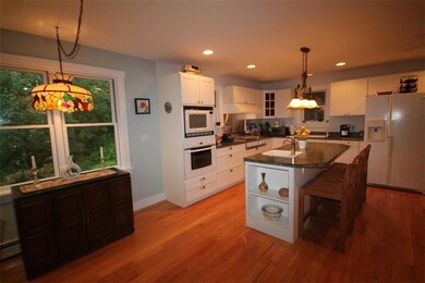 Area for dining between the kitchen...