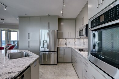 Tailored cabinetry enhances the ambiance of this m