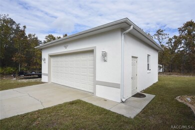 detached 28x28, heated and air conditioned garage.