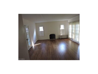 AFTER: REFINISHED FLOORS IN LIVING ROOM WITH FIREP