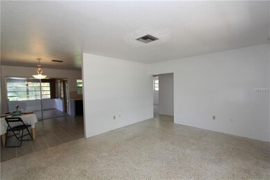 Alternate view of the living room.  The hallway le
