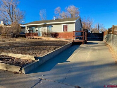 Note the long concrete driveway!