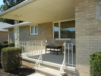 What a lovely front porch on which to relax!