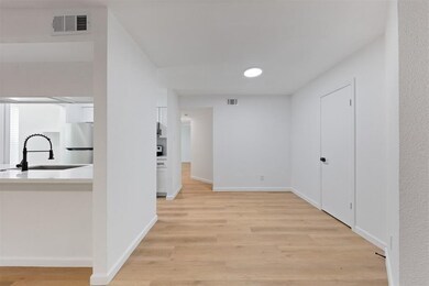 Bright and modern, this room features light wood f