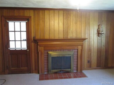 Family Room. Wood burning fireplace sold 