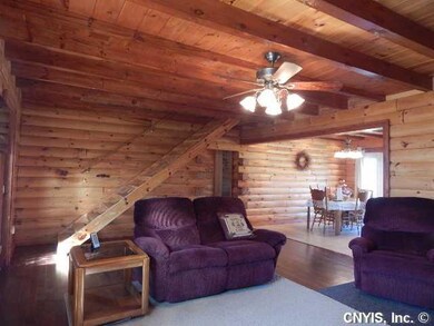 Living Room. VIEW FROM END OF LIVING ROOM IN DININ