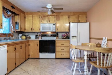 Roomy Kitchen with White Appliances