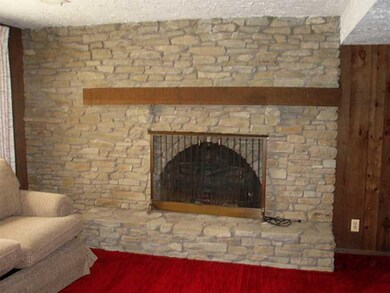 Basement/Game Room. Electric stone fire place enha