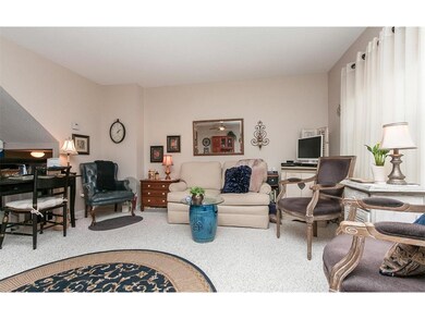 Another view of lively living room from dining are