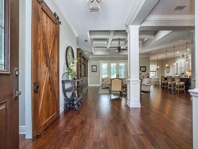 Entry into the foyer leading to the Great Room.  E