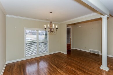 Lovely Dining Room with gleaming Hardwood Flooring