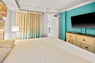 Bedroom featuring crown molding