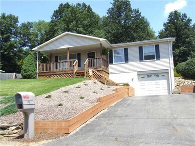 Exterior Front. DEEP SINGLE CAR GARAGE, 2 SPACES O