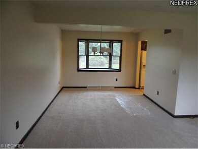 Dining room with a beautiful bow window.