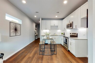 White cabinets with granite countertops