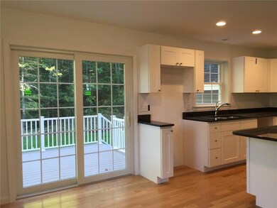 Bright sunny kitchen with deck...