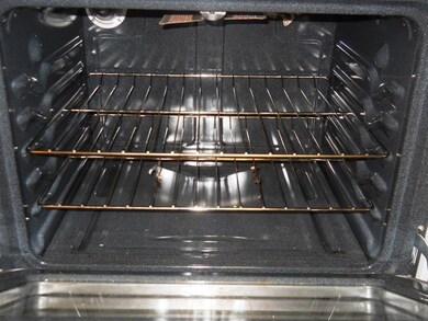 6) Kitchen: Newer Stove with Clean Interior.