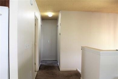 1st Floor Hallway leading into bedrooms.  Master o
