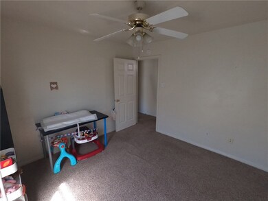 Rec room featuring carpet flooring and ceiling fan