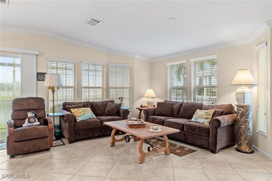 Living room featuring light tile patterned floorin