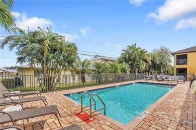 Community pool with a patio area