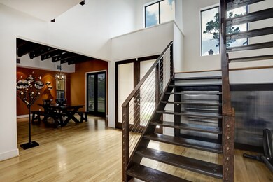 Entry way with dining room on left and iron and ca