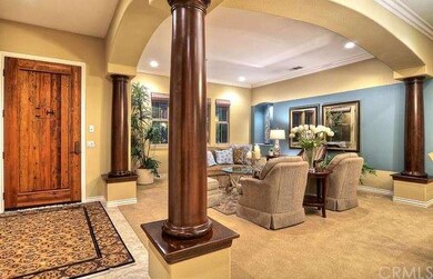 Front door. View of the living room, recessed ligh