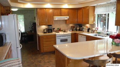 Large Kitchen Area w/ Under Cabinet Lighting and L