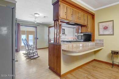 Kitchen with snack bar/laundry/ pantry