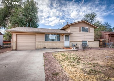 Tri-level home featuring a garage